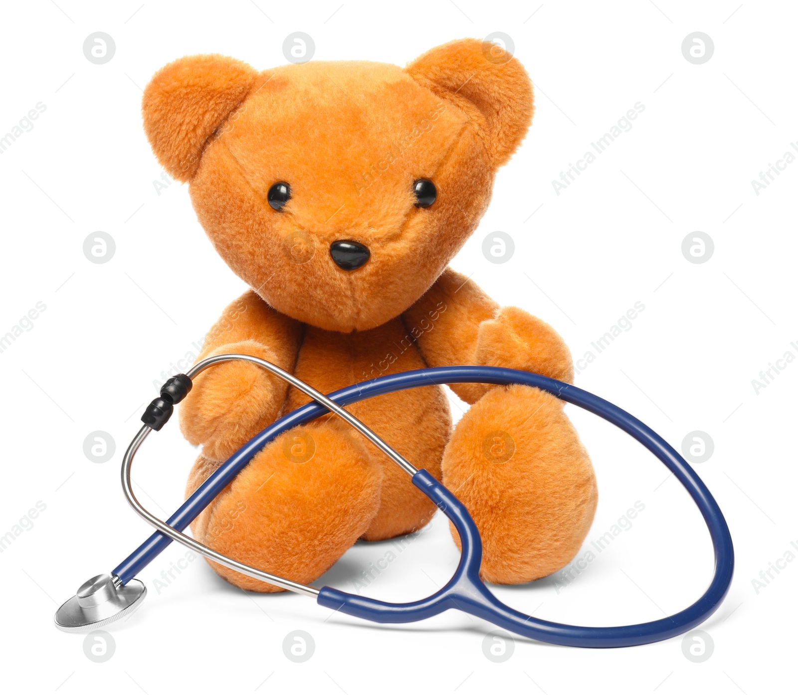 Photo of Pediatrics concept. Teddy bear with stethoscope isolated on white