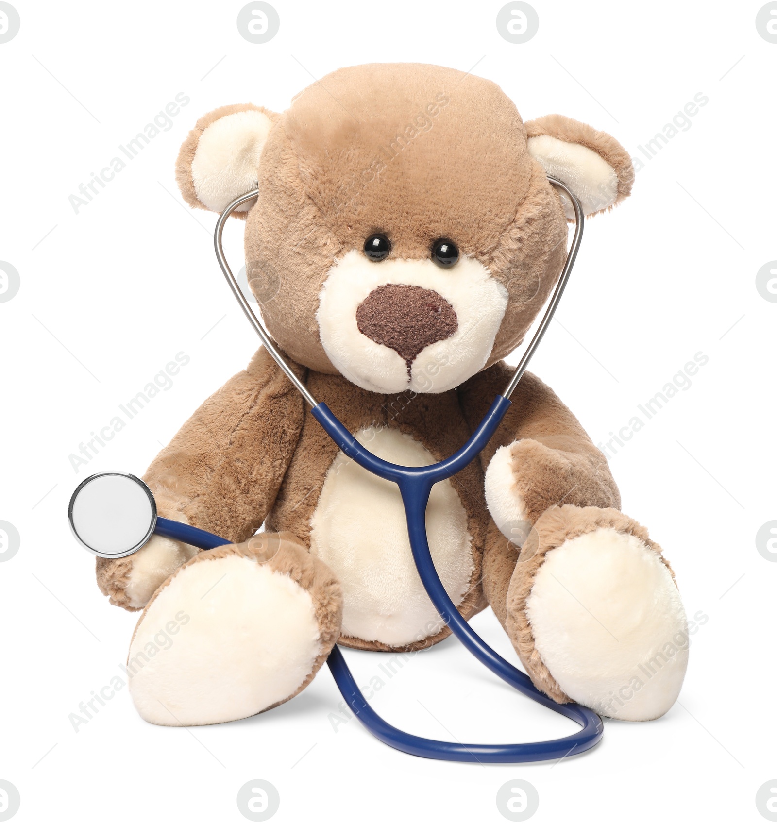 Photo of Pediatrics concept. Teddy bear with stethoscope isolated on white