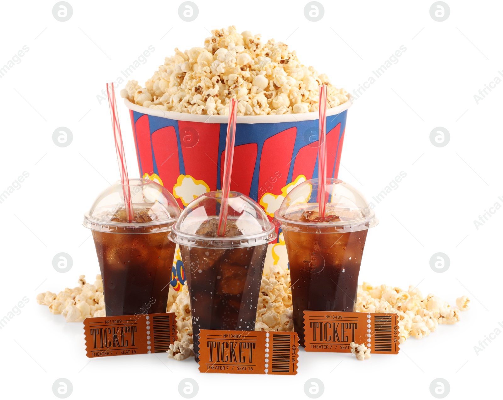 Photo of Tasty popcorn, soda drinks and movie tickets isolated on white