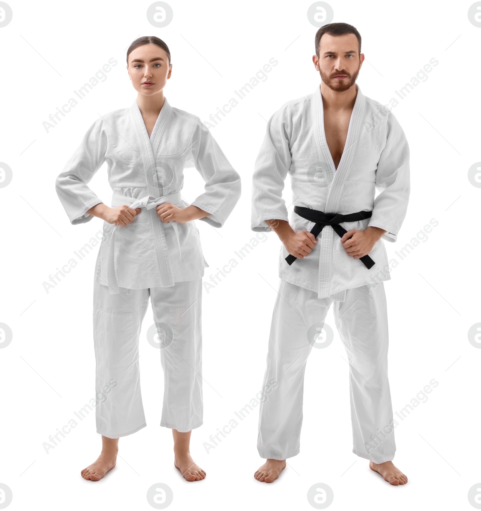 Photo of Karate fighters in uniform on white background