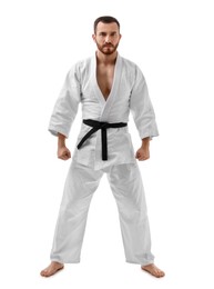 Photo of Karate fighter in uniform on white background