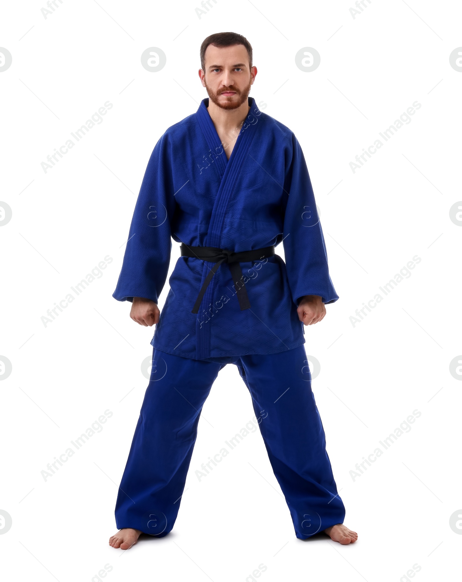 Photo of Karate fighter in uniform on white background