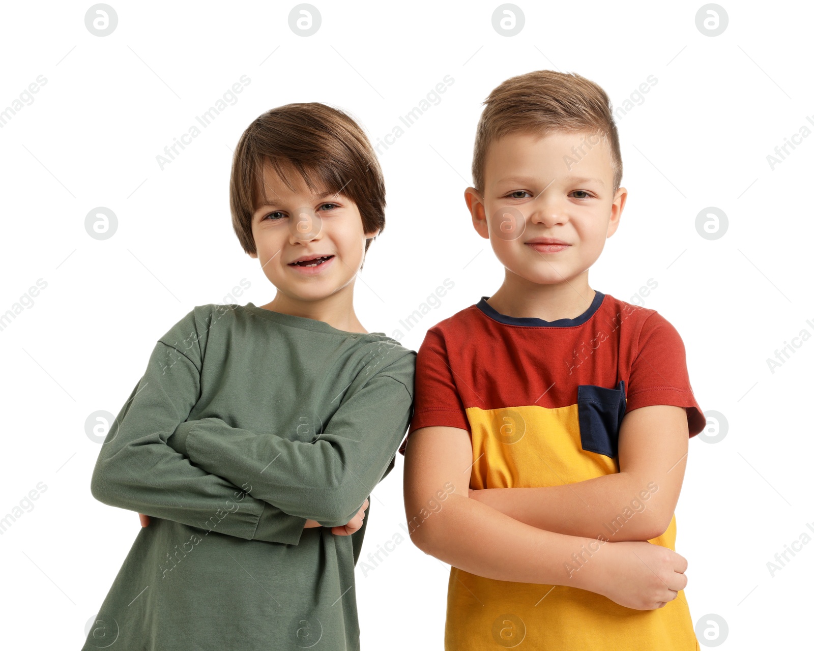 Photo of Portrait of cute brothers on white background