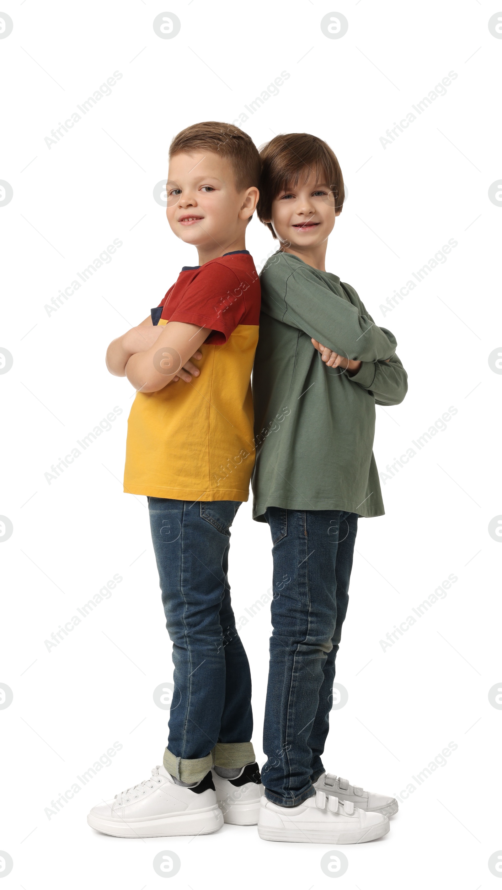 Photo of Full length portrait of cute brothers on white background