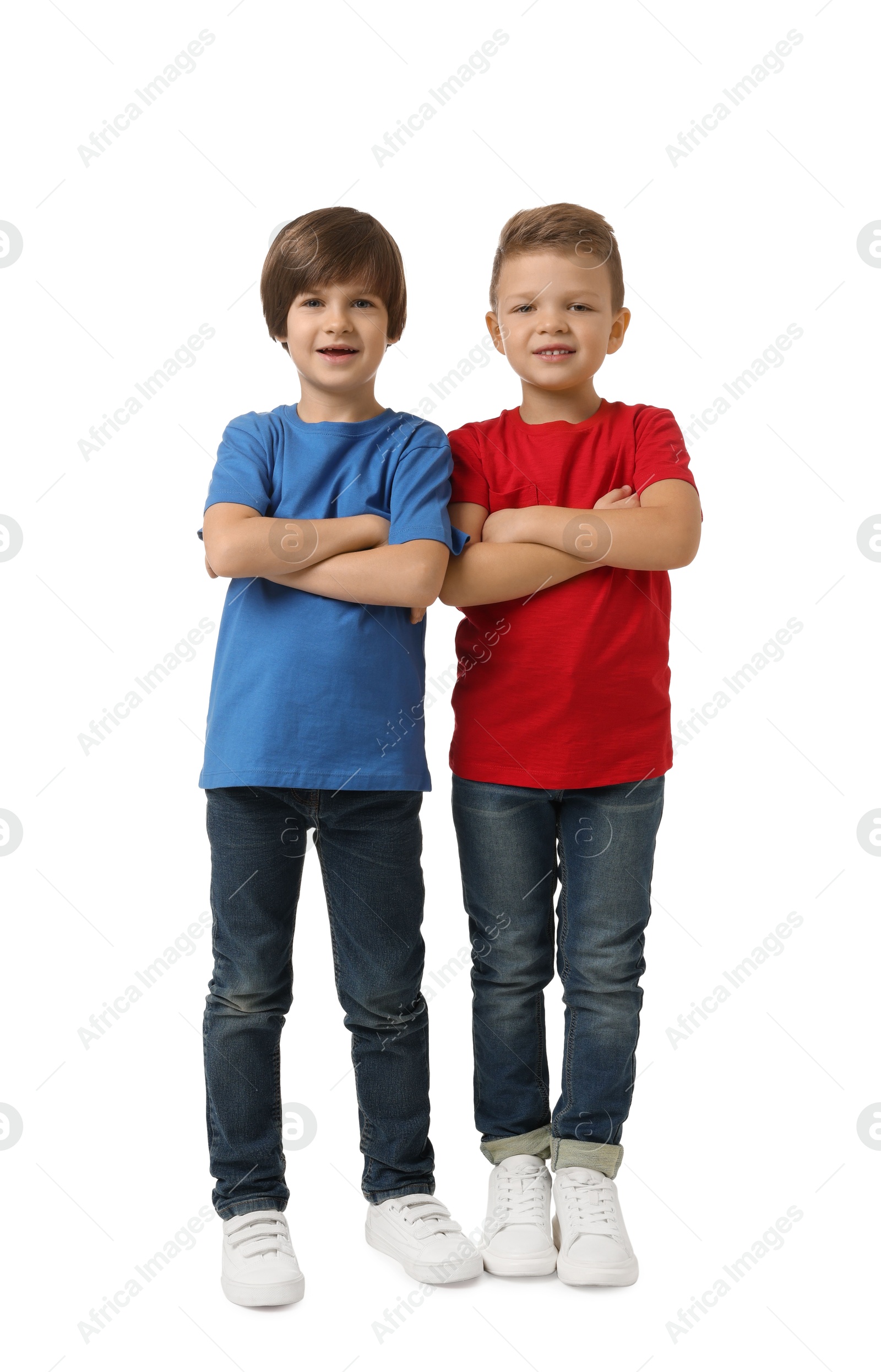 Photo of Full length portrait of cute brothers on white background