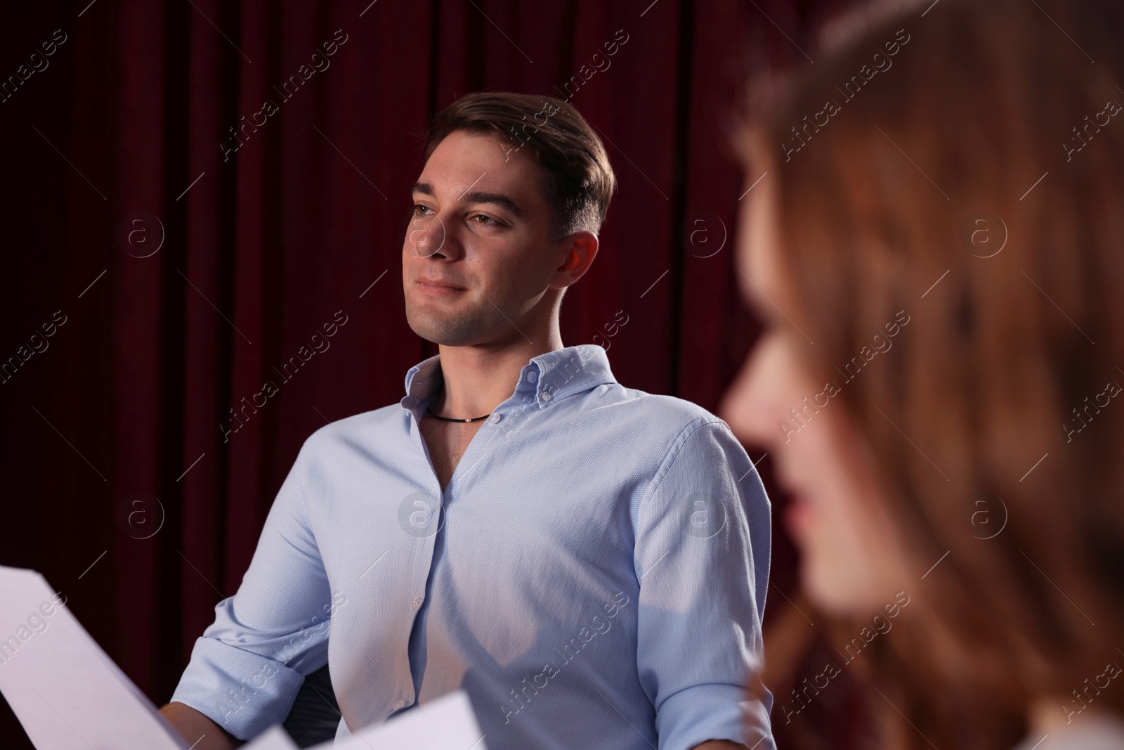 Photo of Professional actors rehearsing on stage in theatre