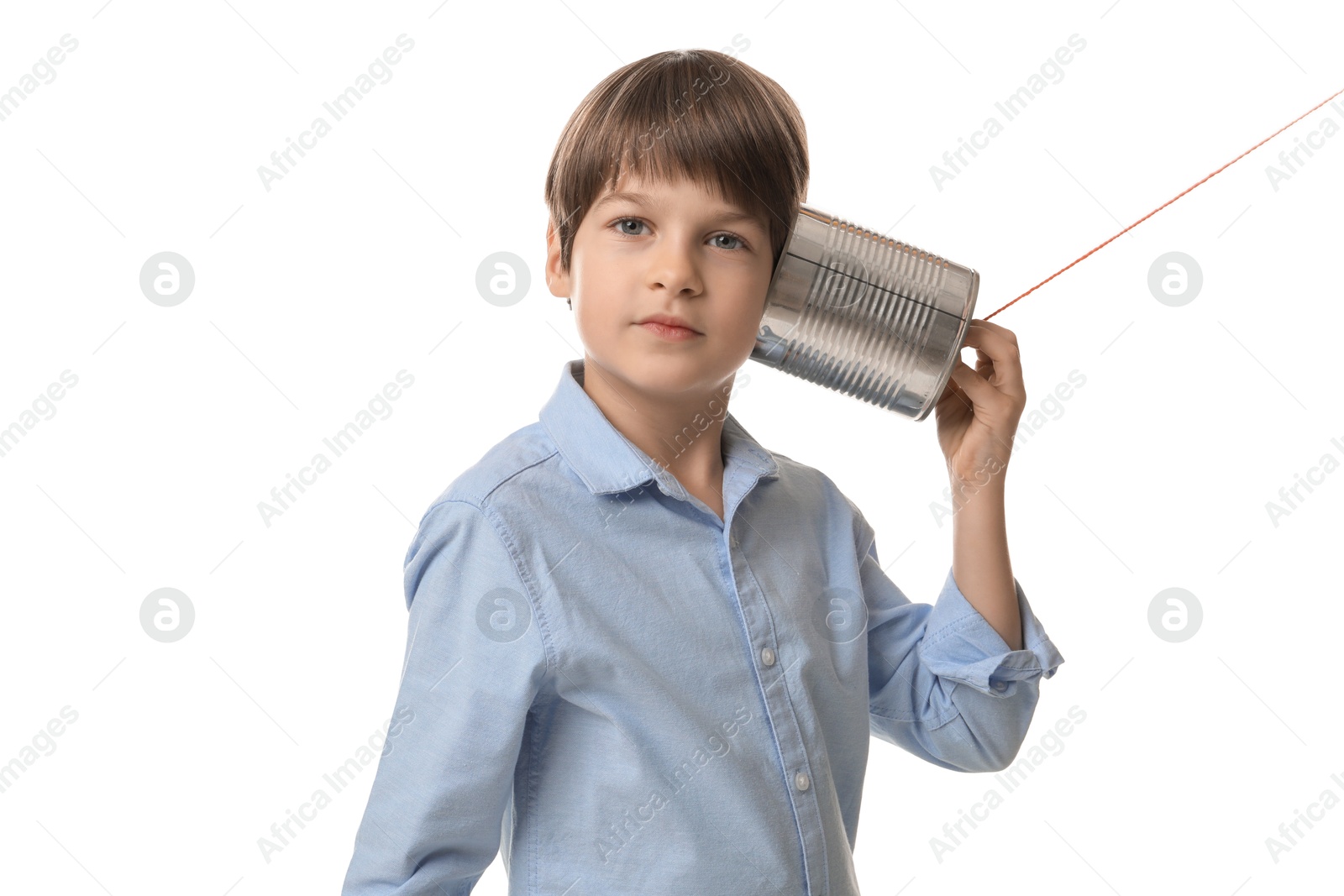 Photo of Boy using tin can telephone on white background