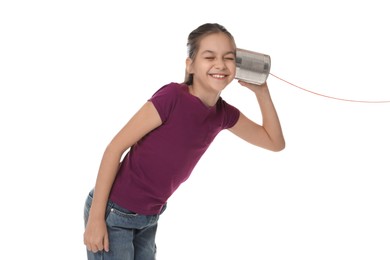 Photo of Girl using tin can telephone on white background