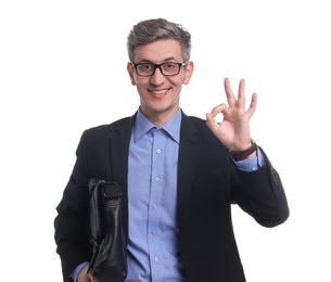 Photo of Businessman with briefcase showing okay gesture on white background