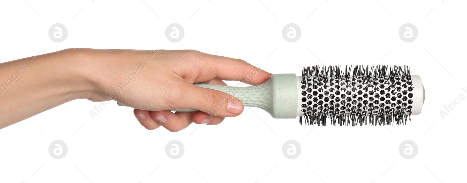 Photo of Woman with round hair brush on white background, closeup