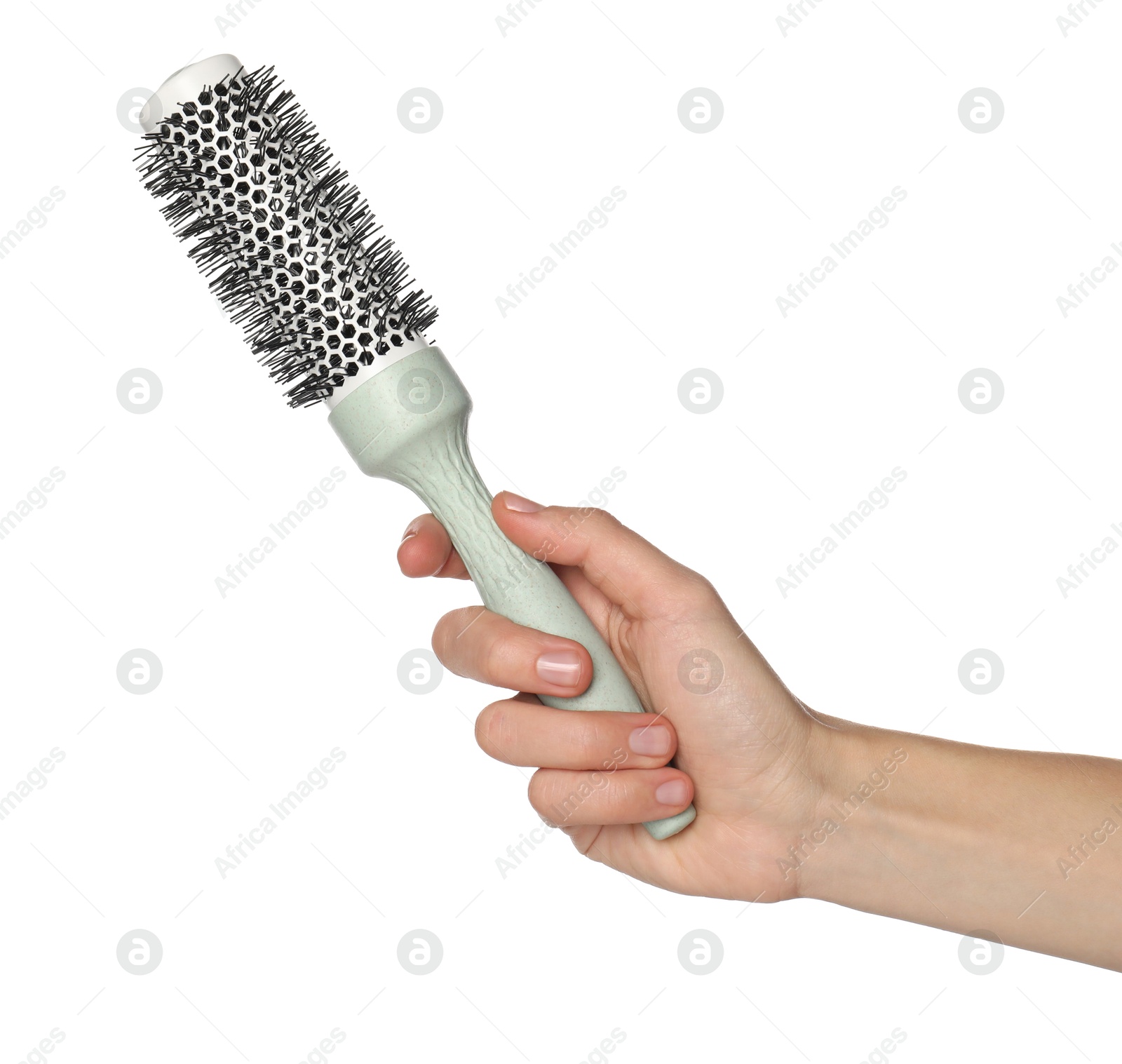 Photo of Woman with round hair brush on white background, closeup