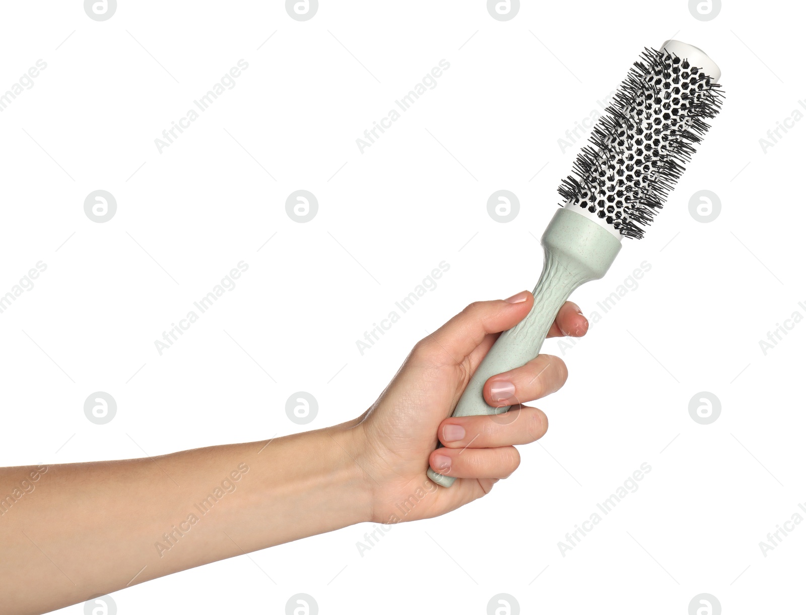 Photo of Woman with round hair brush on white background, closeup