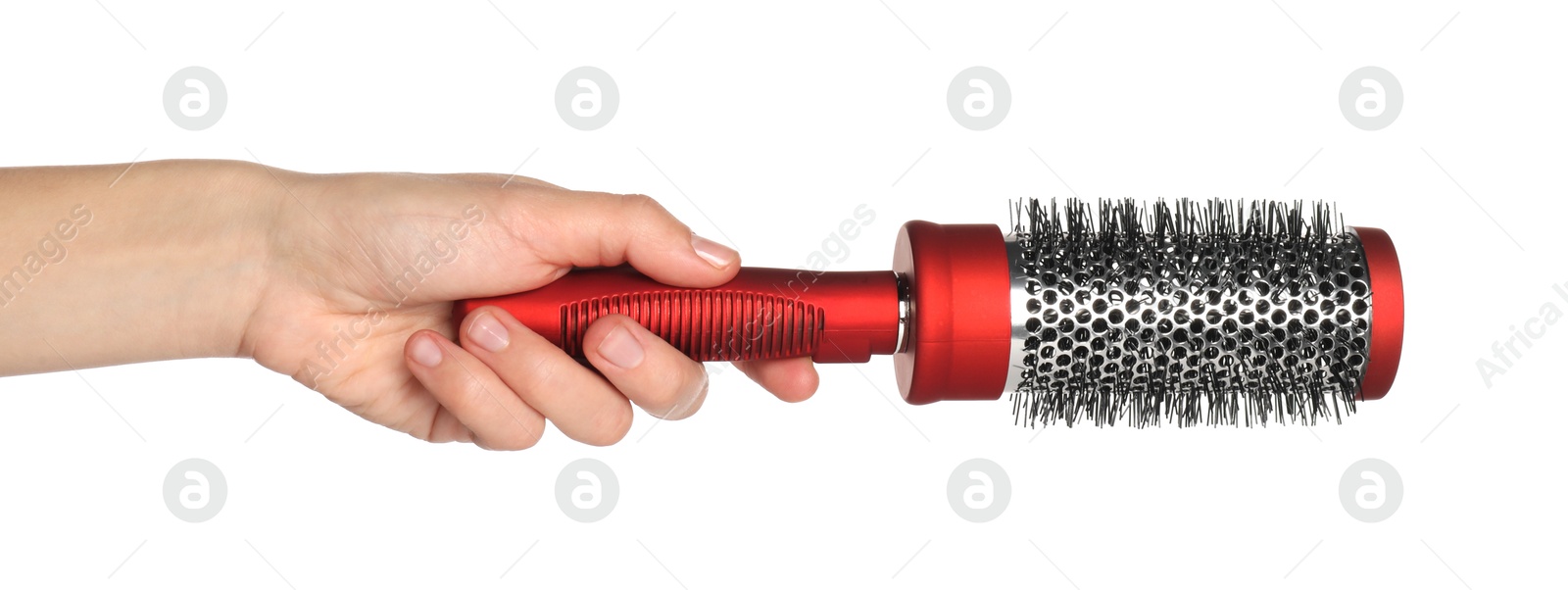 Photo of Woman with round hair brush on white background, closeup