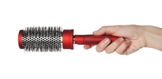 Photo of Woman with round hair brush on white background, closeup