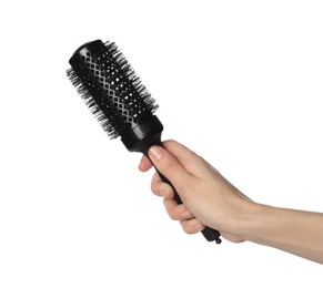 Photo of Woman with round black hair brush on white background, closeup