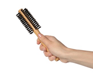 Photo of Woman with round wooden hair brush on white background, closeup