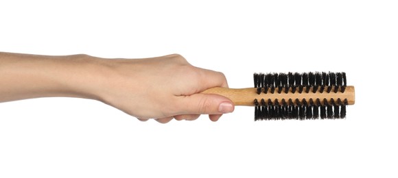 Photo of Woman with round wooden hair brush on white background, closeup