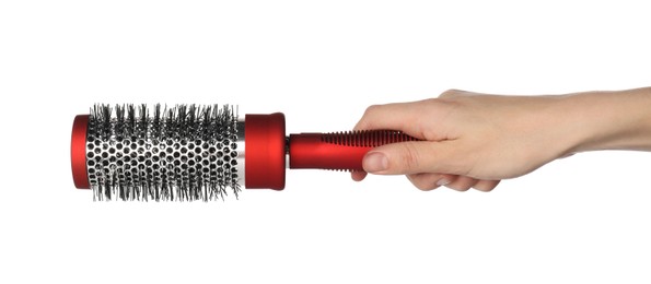 Photo of Woman with round red hair brush on white background, closeup