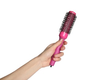 Photo of Woman with round pink hair brush on white background, closeup