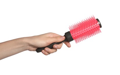 Photo of Woman with round hair brush on white background, closeup