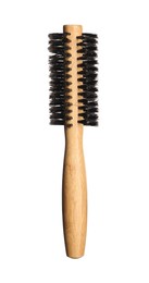 Photo of Hairdresser tool. Round wooden brush isolated on white