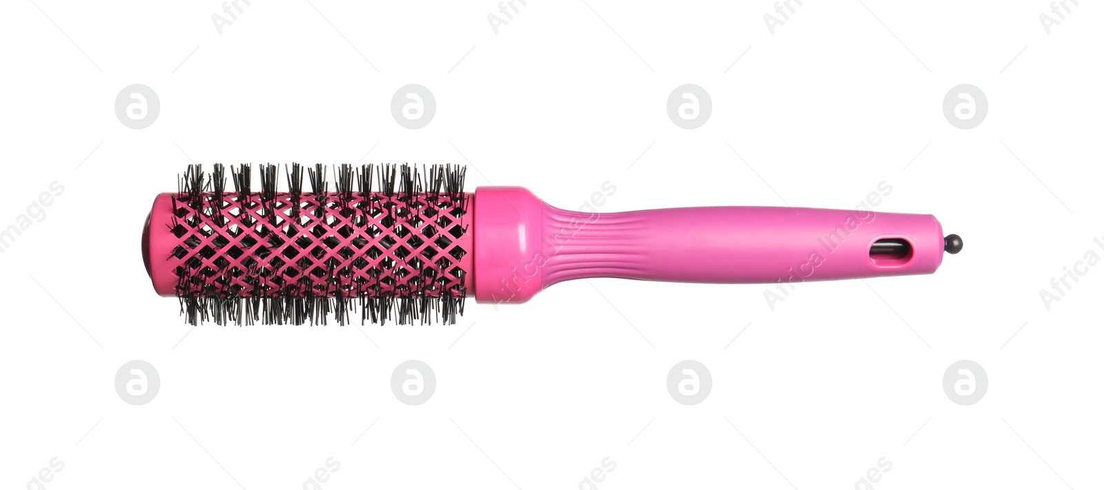 Photo of Hairdresser tool. Round pink brush isolated on white