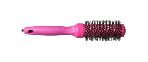 Photo of Hairdresser tool. Round pink brush isolated on white