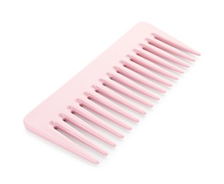 Photo of One pink plastic comb isolated on white