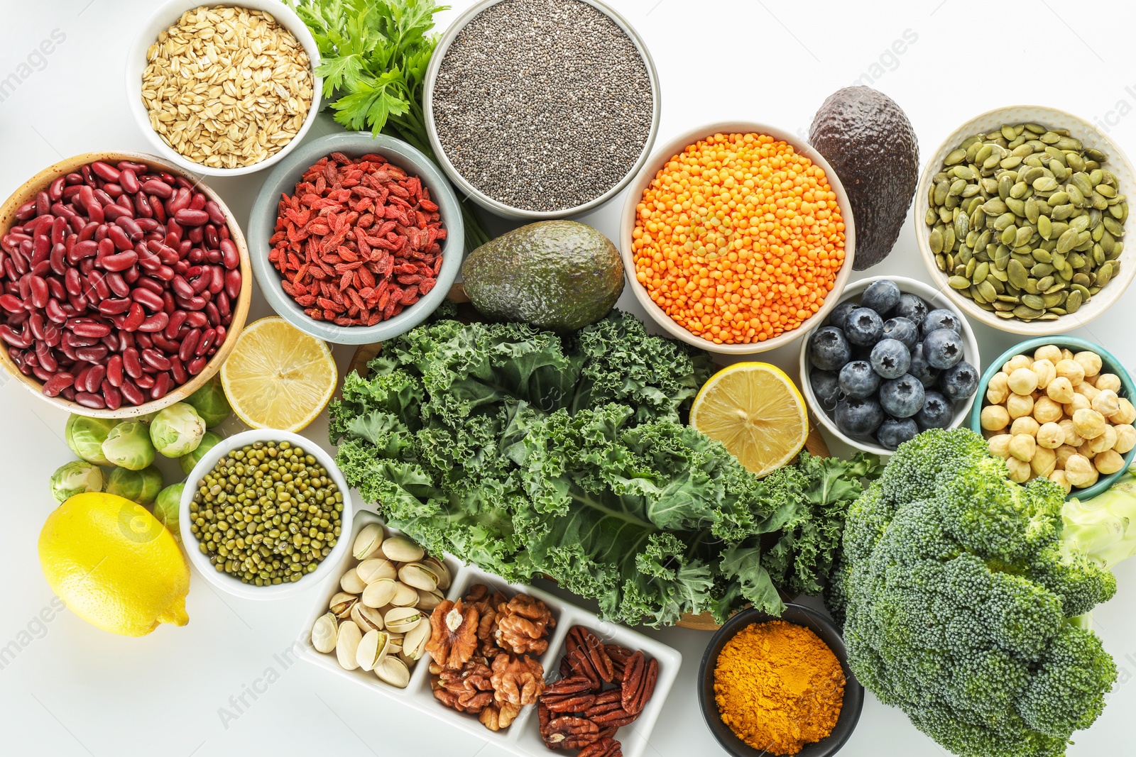 Photo of Superfood. Different healthy food products on white background, flat lay