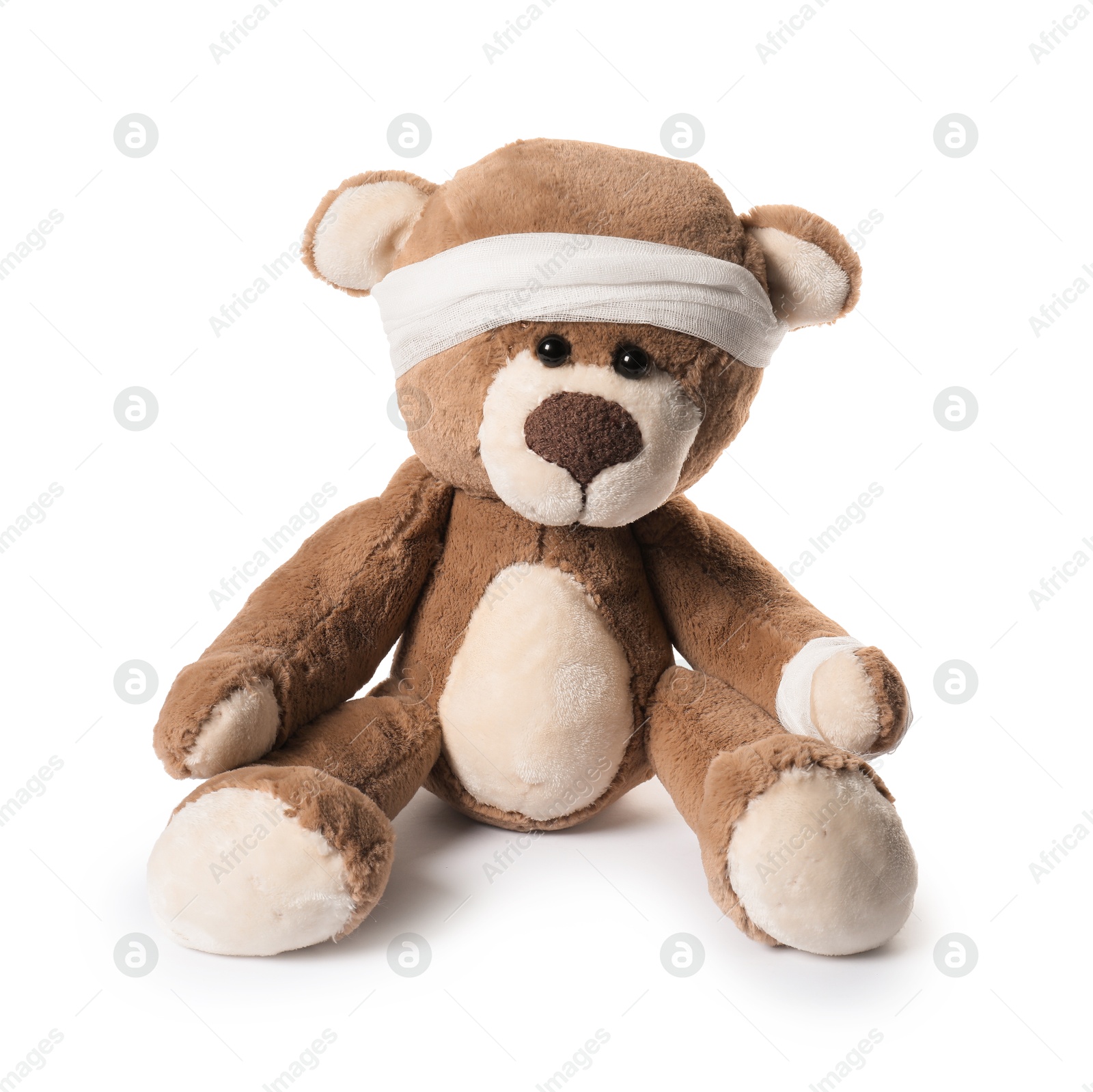 Photo of Teddy bear with bandage isolated on white