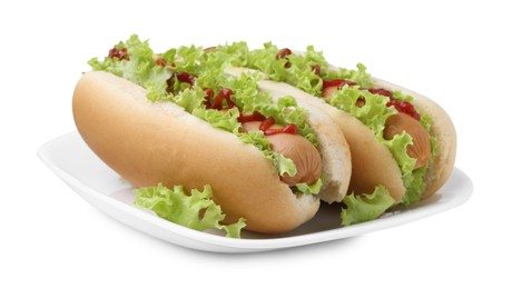 Photo of Tasty hot dogs with lettuce and ketchup isolated on white