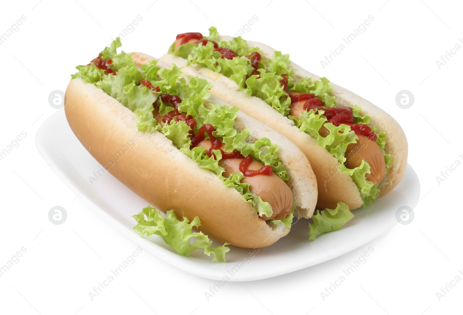 Photo of Tasty hot dogs with lettuce and ketchup isolated on white