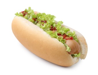 Photo of Tasty hot dog with lettuce and ketchup isolated on white