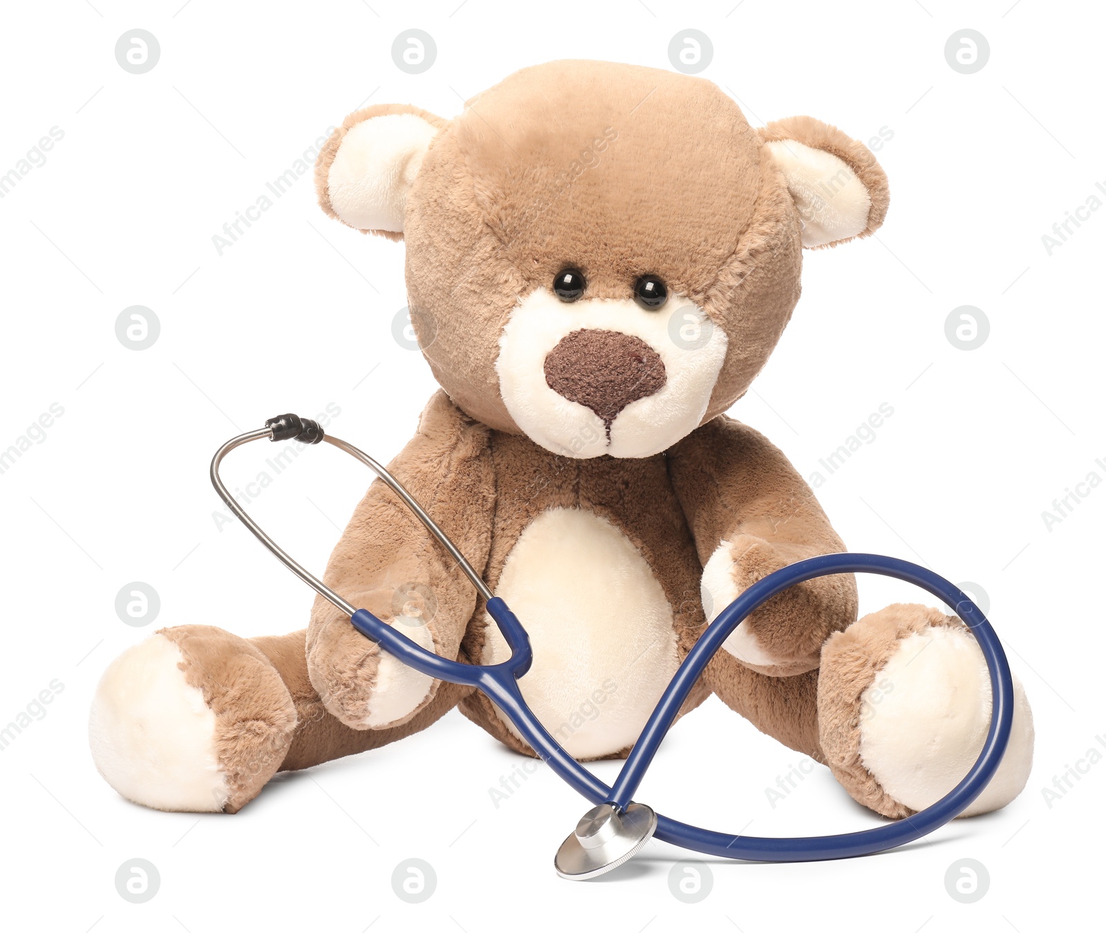 Photo of Pediatrics concept. Teddy bear with stethoscope isolated on white