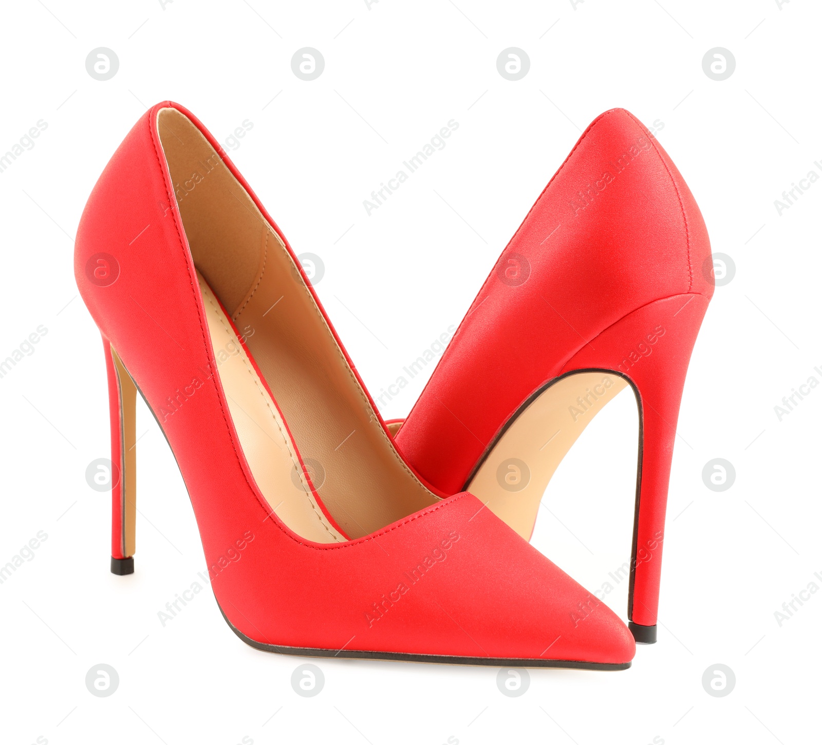 Photo of Pair of stylish red women's shoes isolated on white