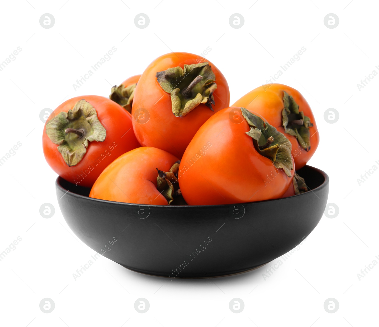 Photo of Delicious ripe juicy persimmons in bowl isolated on white