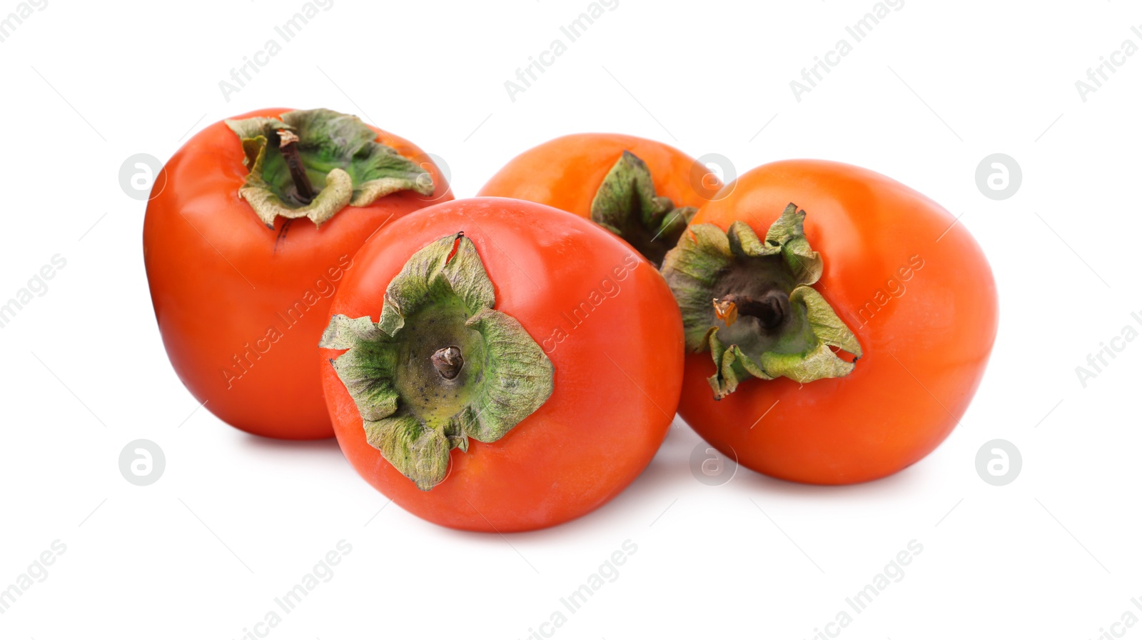 Photo of Delicious ripe juicy persimmons isolated on white