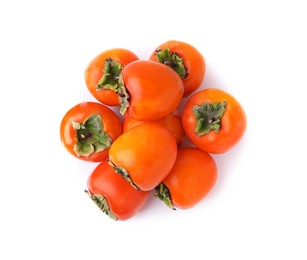 Delicious ripe juicy persimmons isolated on white, top view