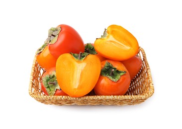 Photo of Delicious fresh juicy persimmons in wicker basket isolated on white