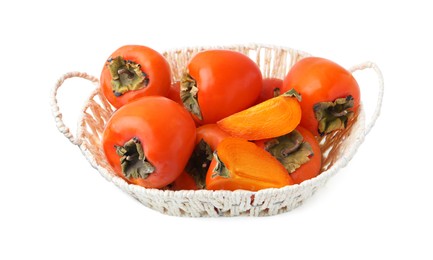 Ripe persimmons in wicker basket isolated on white