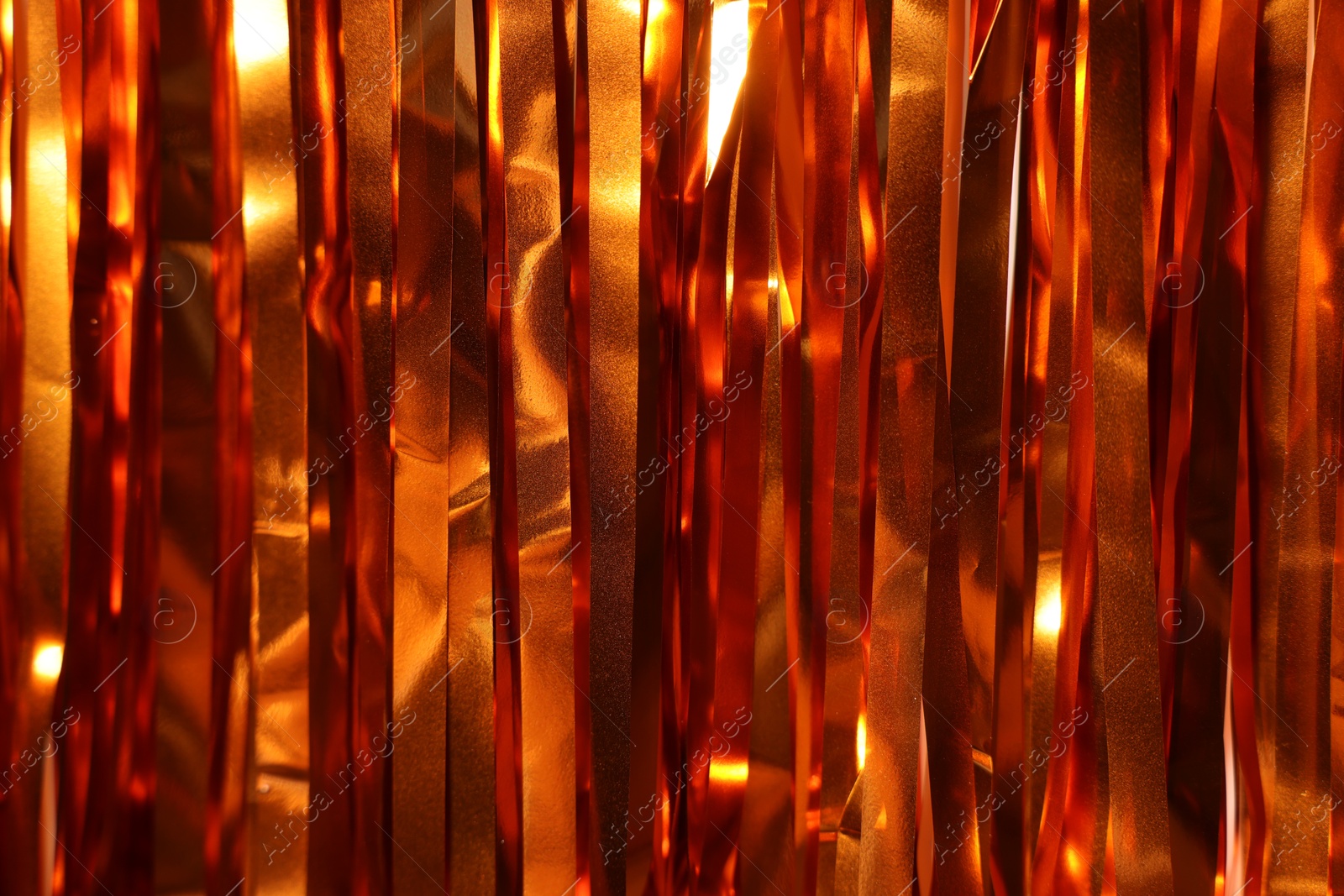 Photo of Shiny foil curtain as background, closeup view