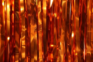 Photo of Shiny foil curtain as background, closeup view