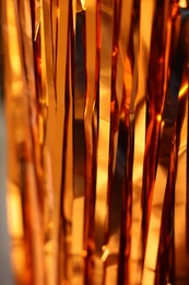 Photo of Shiny foil curtain as background, closeup view