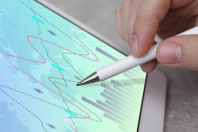 Image of Stock exchange. Man analysing financial market on tablet, closeup. Charts on device screen. Planning trading and investing