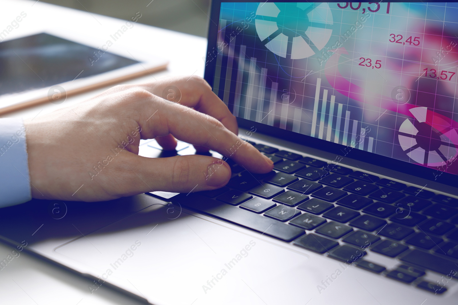 Image of Stock exchange. Man analysing financial market on laptop, closeup. Charts and information on device screen. Planning trading and investing