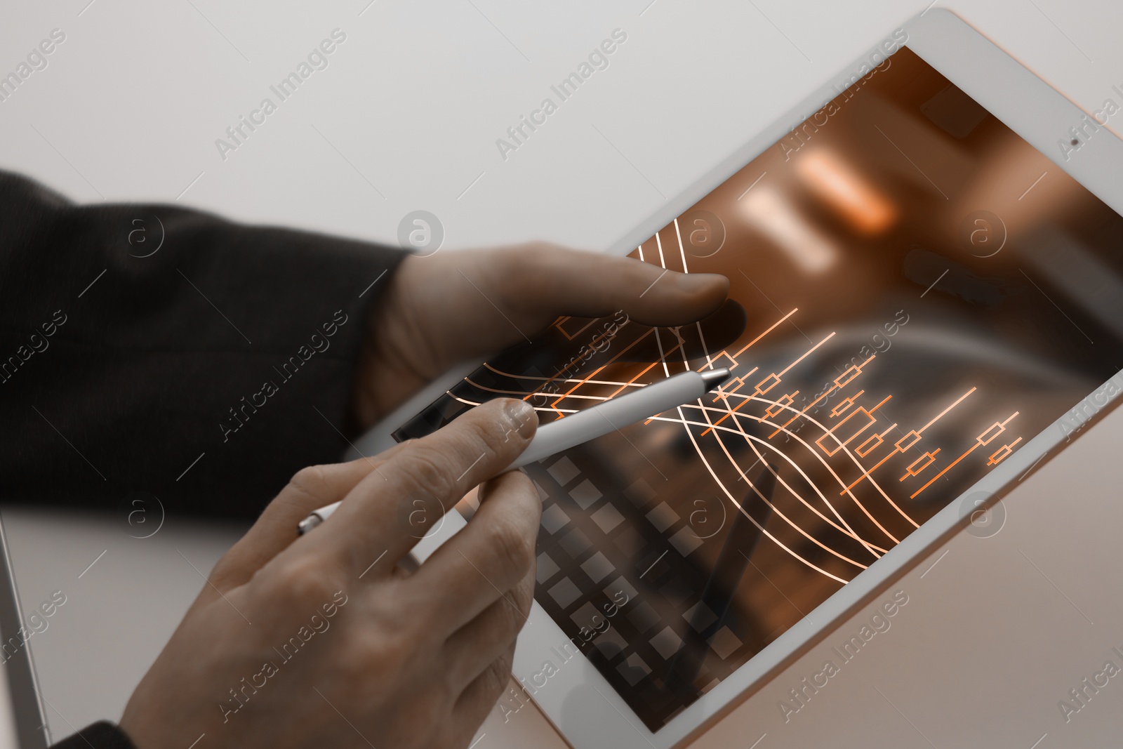 Image of Stock exchange. Man analysing financial market on tablet, closeup. Charts on device screen. Planning trading and investing