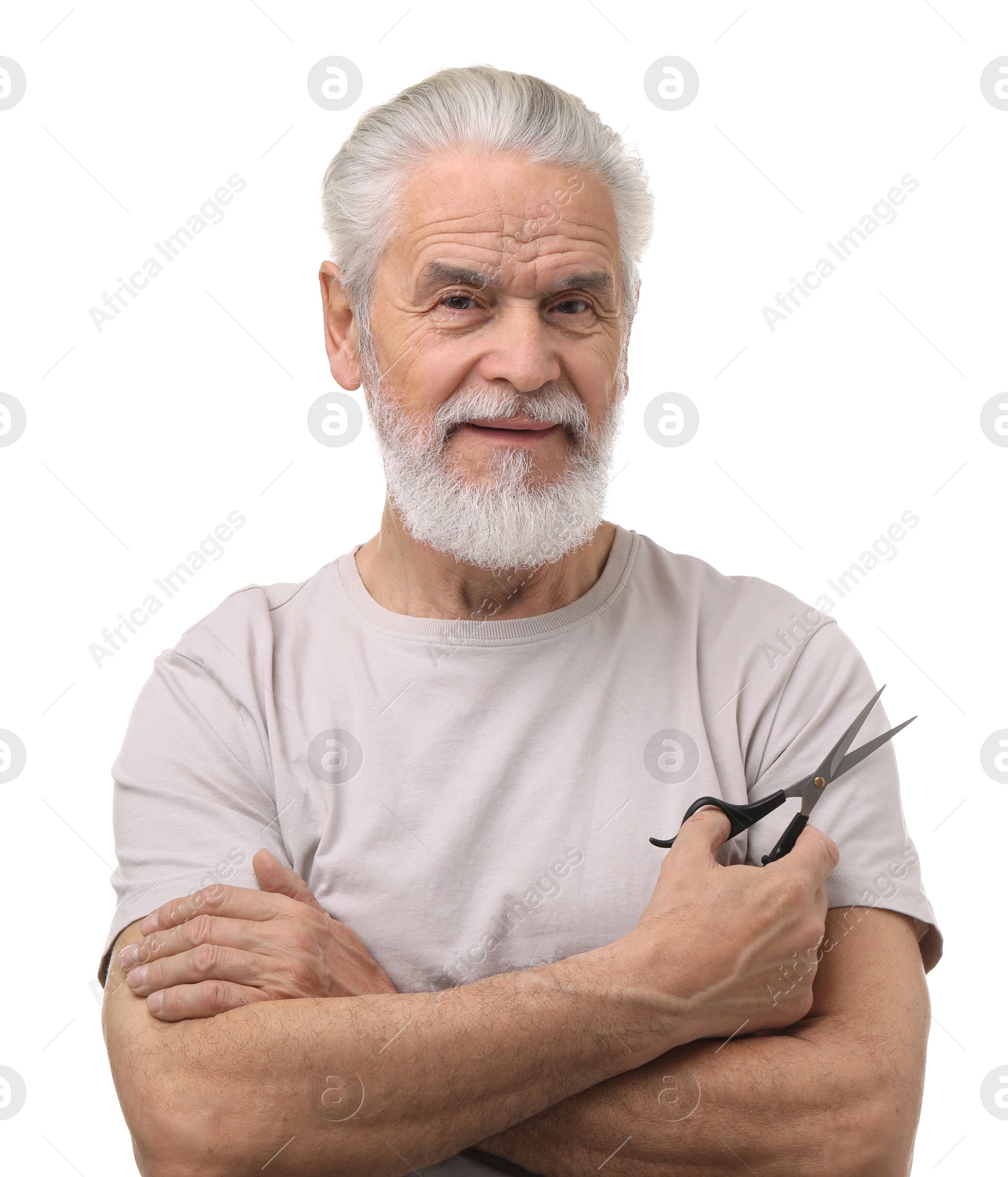 Photo of Bearded senior man holding scissors on white background