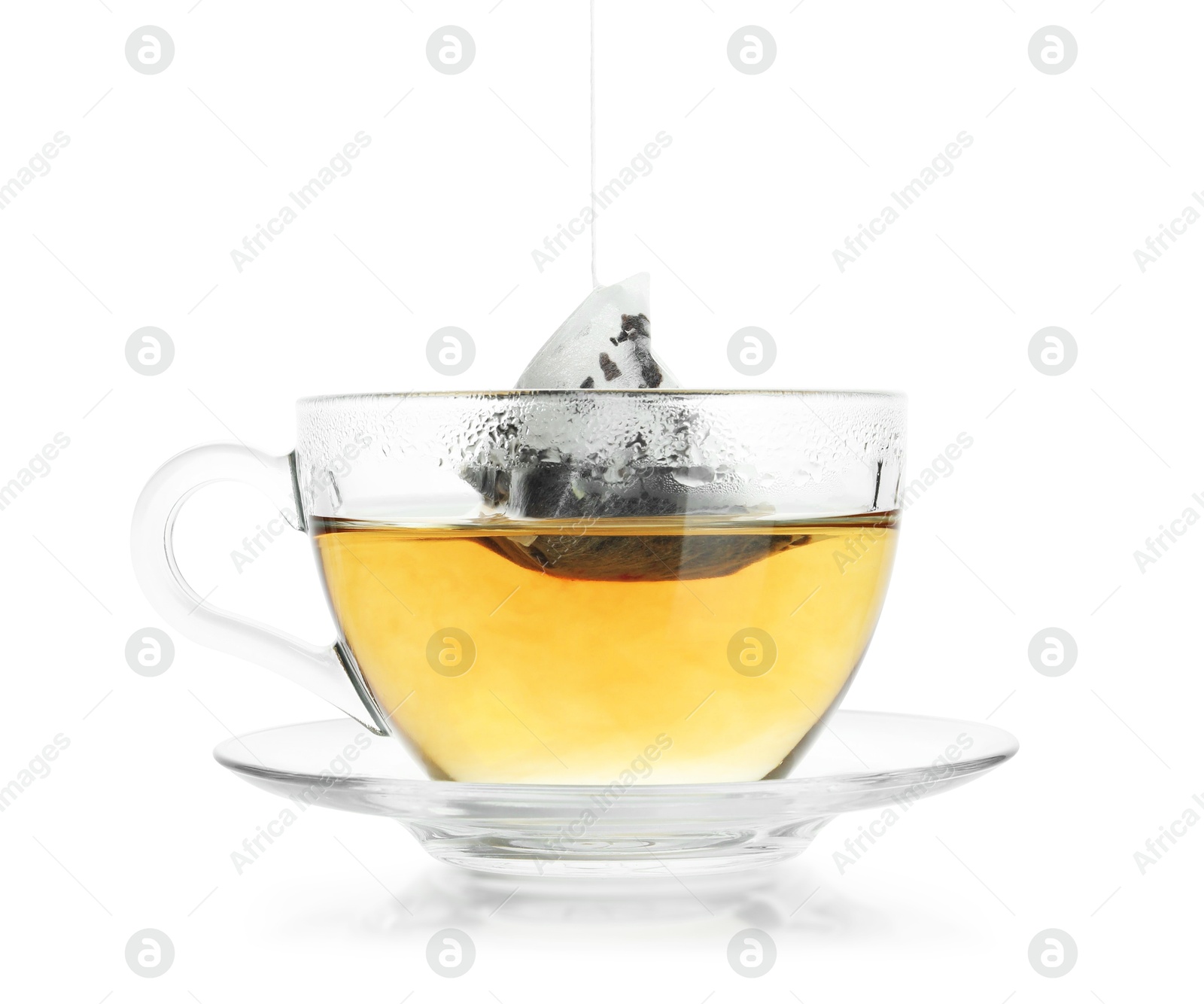 Photo of Cup with tea bag isolated on white