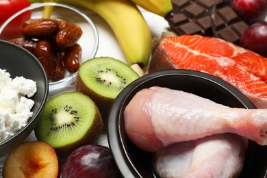 Photo of Different fresh products rich in serotonin on white table