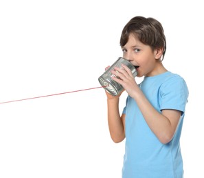 Photo of Boy using tin can telephone on white background